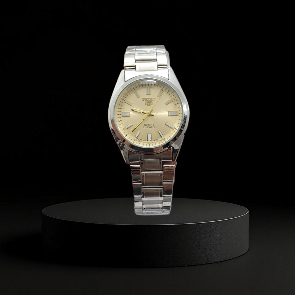 Reloj Seiko Clásico para Hombre - Acero Plateado y Esfera Champán