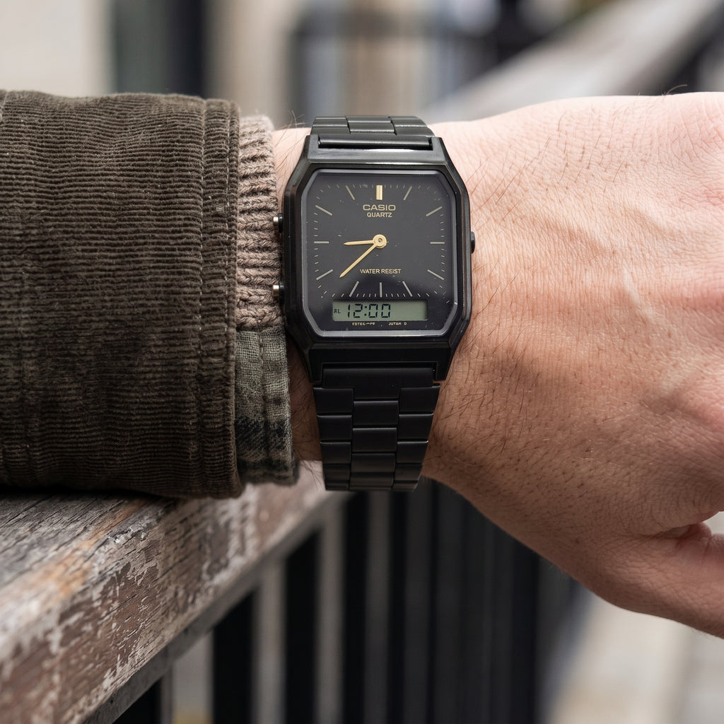 Reloj Casio AQ-230 Vintage para Hombre - Acero Negro con Detalles Dorados